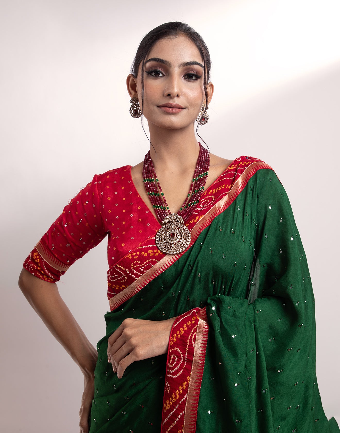 Buy Verdant Green and Red Bandhej Dola Silk Saree online