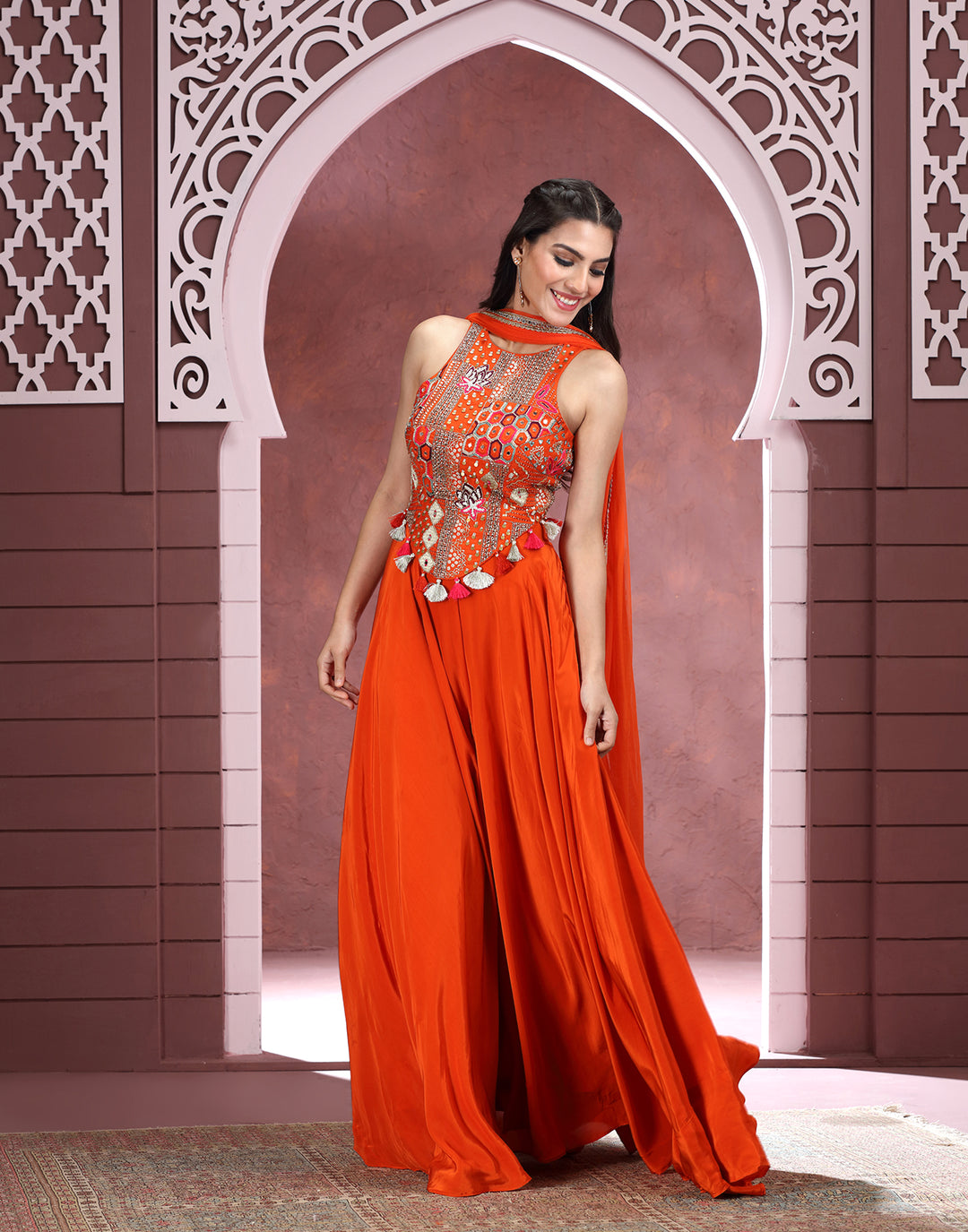 orange indo western dress for women Introducing our exquisite Tangerine Orange Indo Western Outfit, a must-have for all bridesmaids! Whether it's a sangeet, carnival, haldi, or any special occasion, this is the perfect choice to make heads
