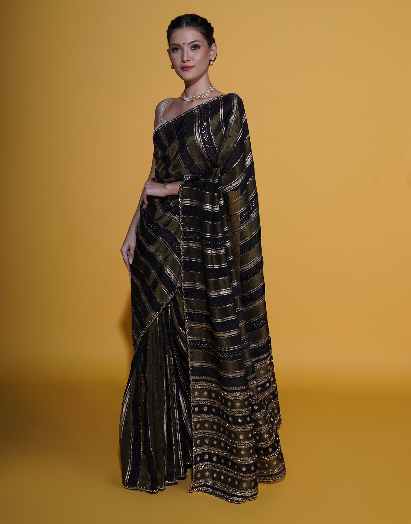 Black And Antique Gold Stripped Embellished Saree