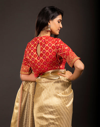 Golden Festive Saree With Contrast Stitched Blouse