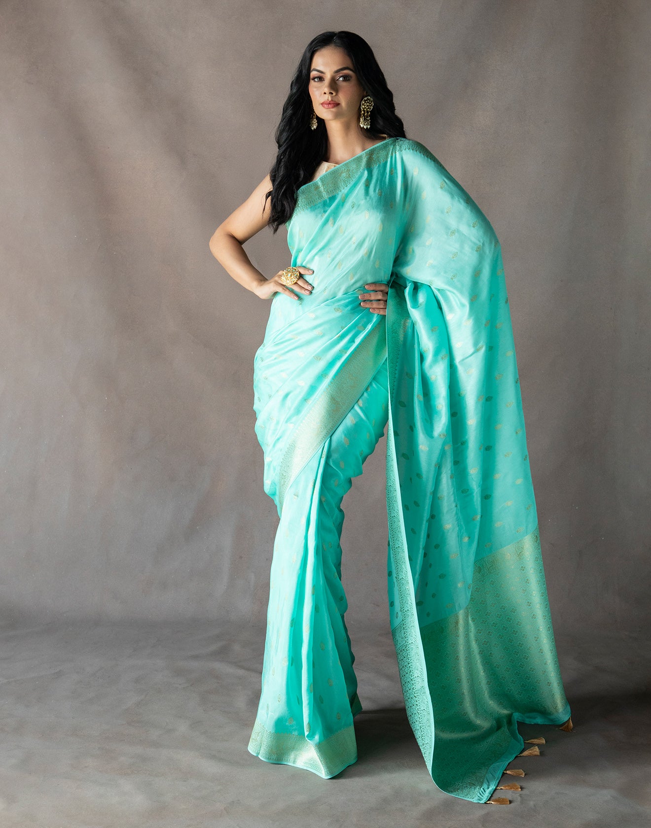 Sea Green Woven Saree In Golden Weave
