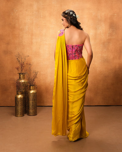 Mustard Rays Pre-Draped Saree With Rani Pink Corset Blouse