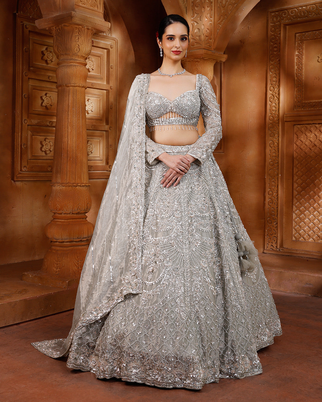 Pale Shimmer Green Net Embellished Lehenga For Sangeet