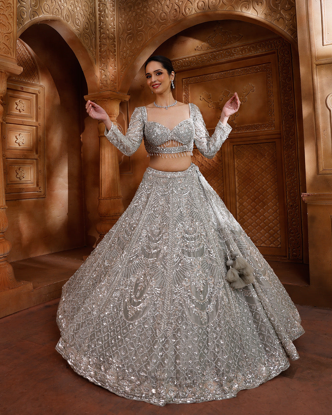 Pale Shimmer Green Net Embellished Lehenga For Sangeet