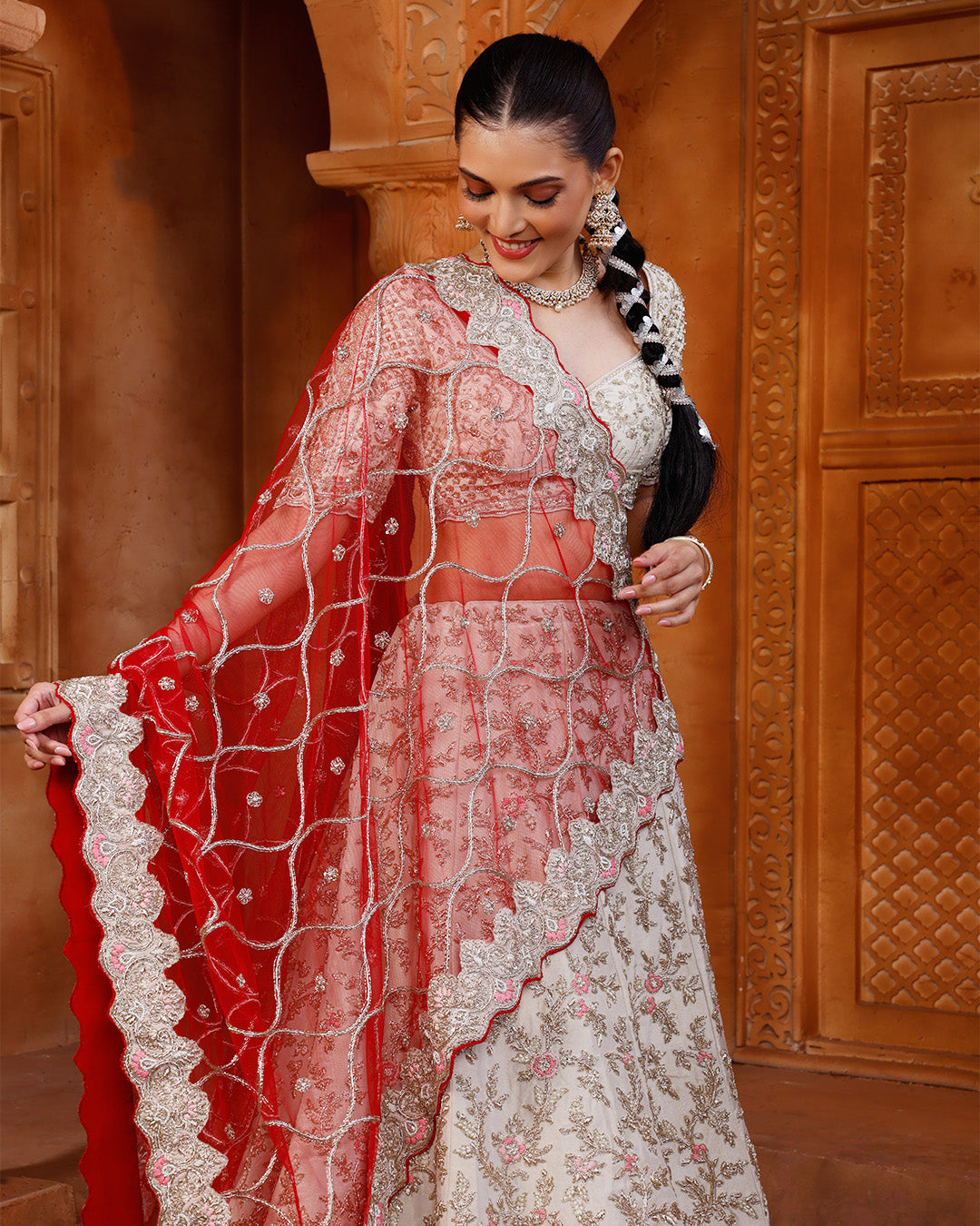 Pearl Ivory Lehenga Set With Unstitched Blouse Fabric And Contrast Red Dupatta