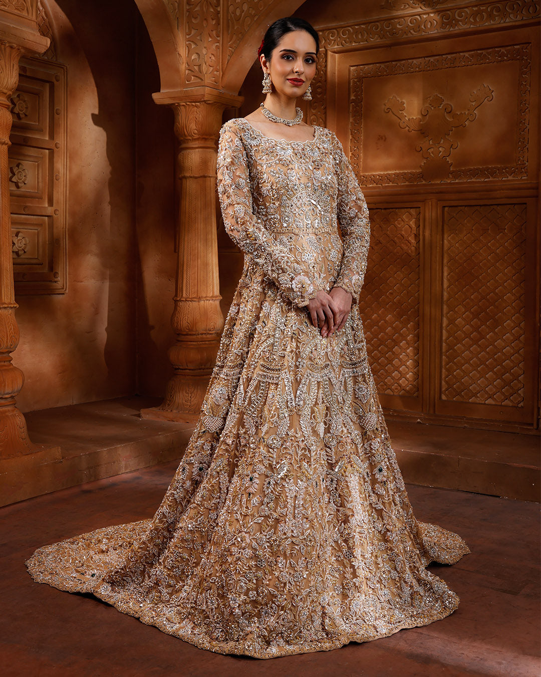 Regal Aureate Embellished Bridal Gown With Trail