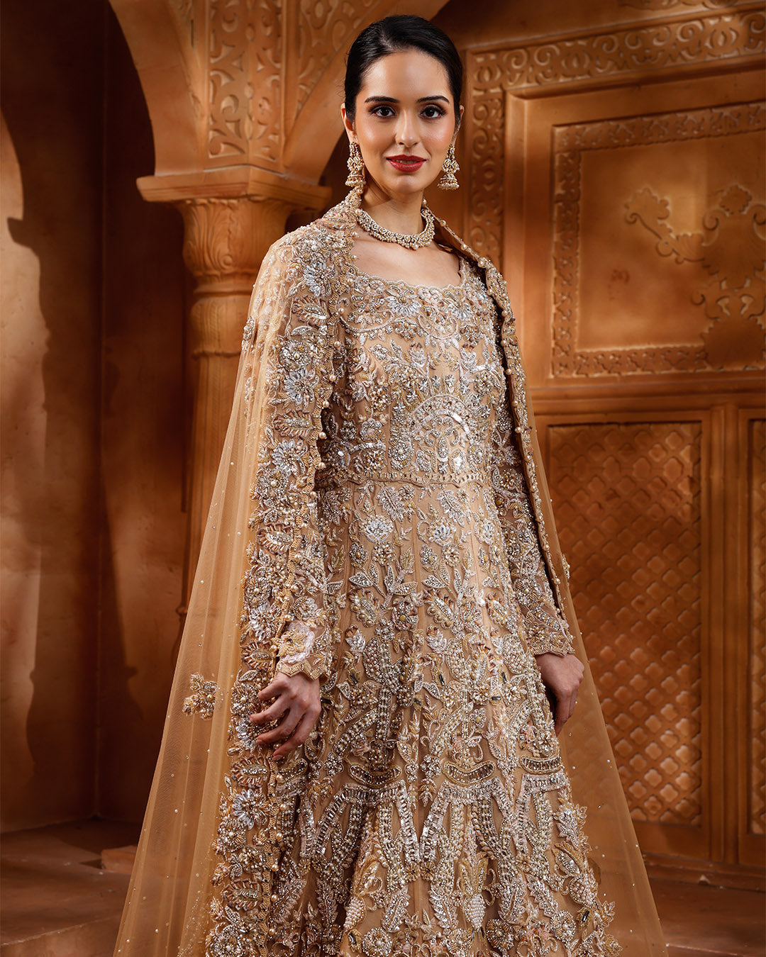 Regal Aureate Embellished Bridal Gown With Trail