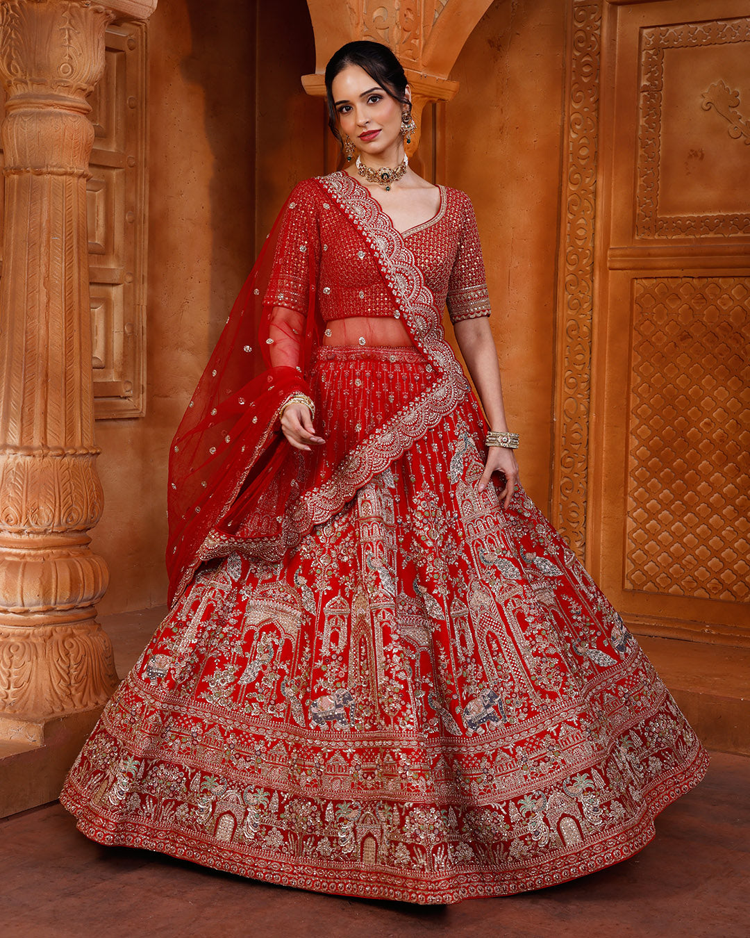 Regal Red Bridal Lehenga With Majestic Peacock & Jharokha Motifs