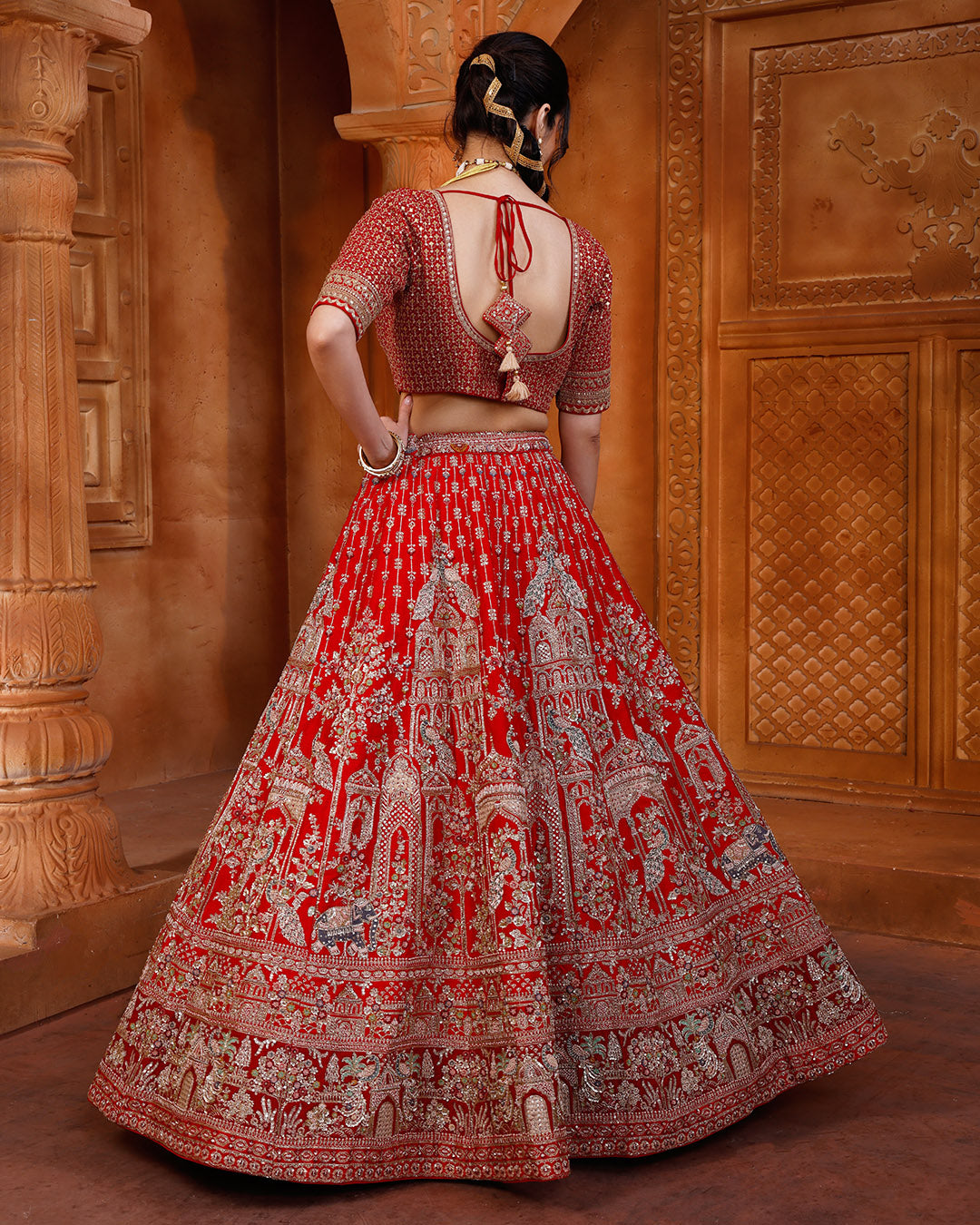 Regal Red Bridal Lehenga With Majestic Peacock & Jharokha Motifs