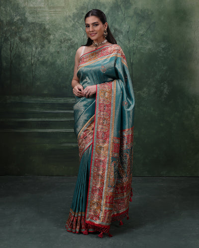 Turquoise Shimmer Silk Saree With Multicolor Embroidered Border And Unstitched Blouse Fabric