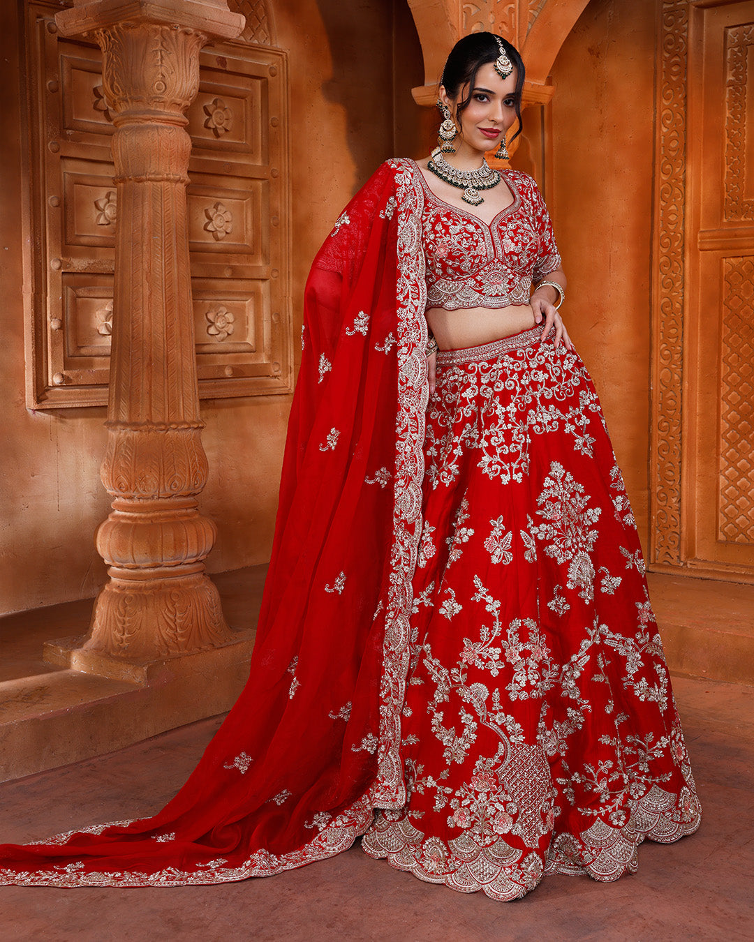 Vibrant Red Embroidered bridal Lehenga In Pure Silk