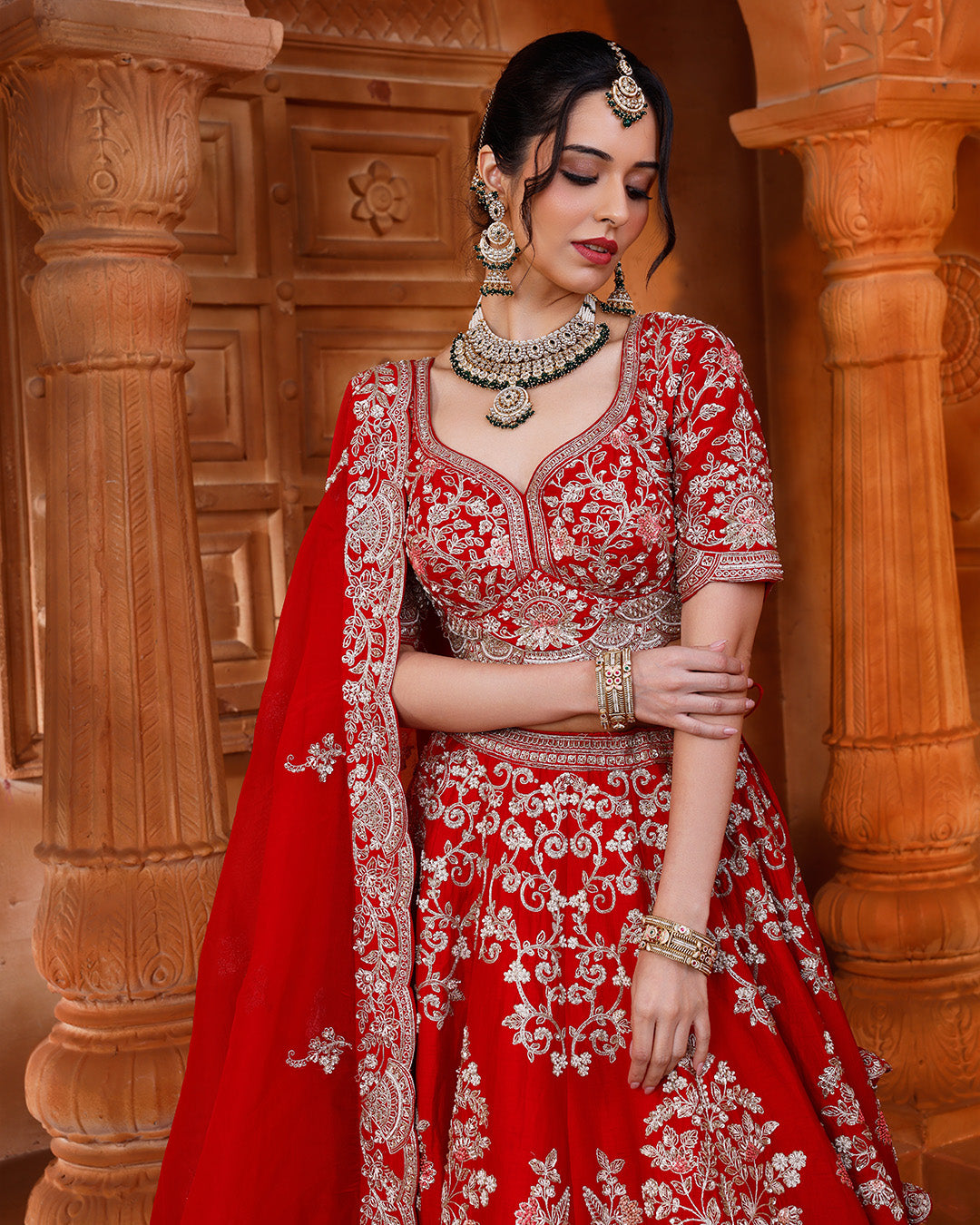 Vibrant Red Embroidered bridal Lehenga In Pure Silk