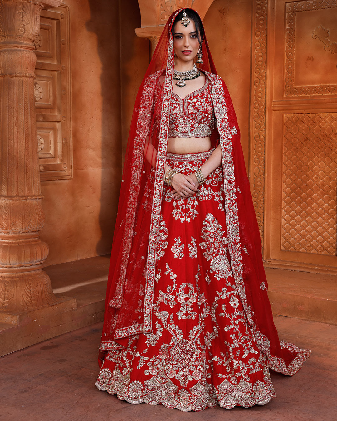 Vibrant Red Embroidered bridal Lehenga In Pure Silk